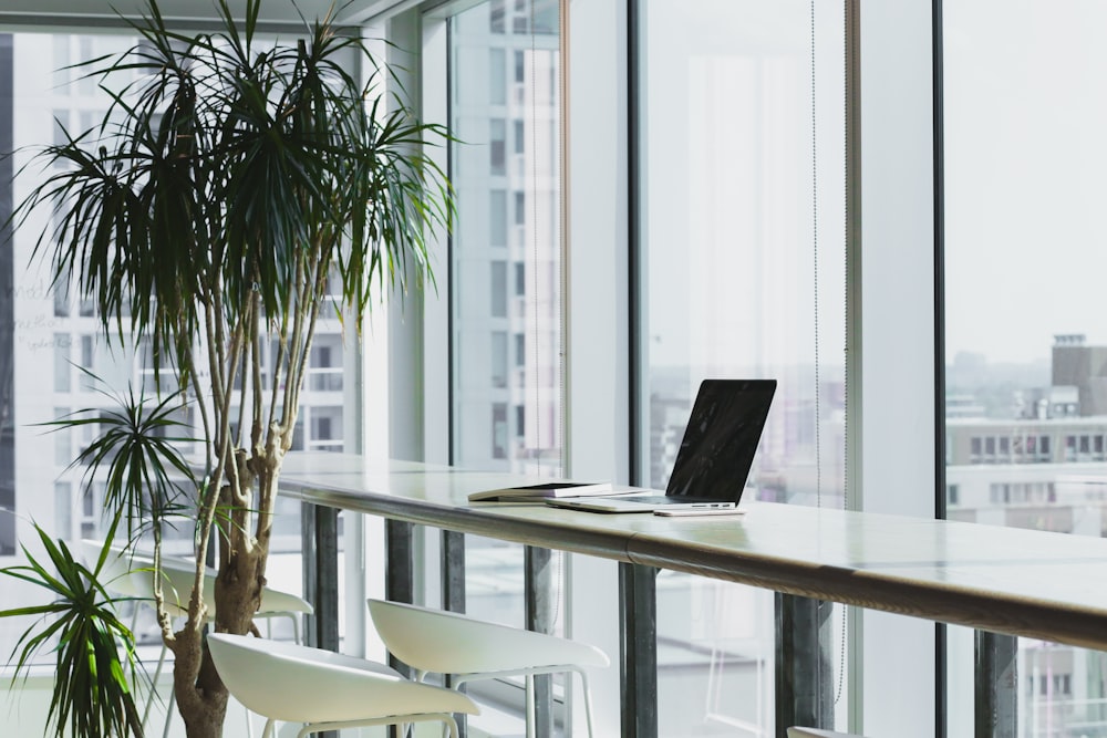 Employees working in a busy open-plan office